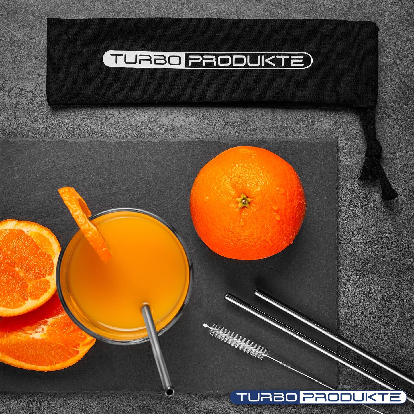 turbo strohhalm in orangensaft vogelperspektive